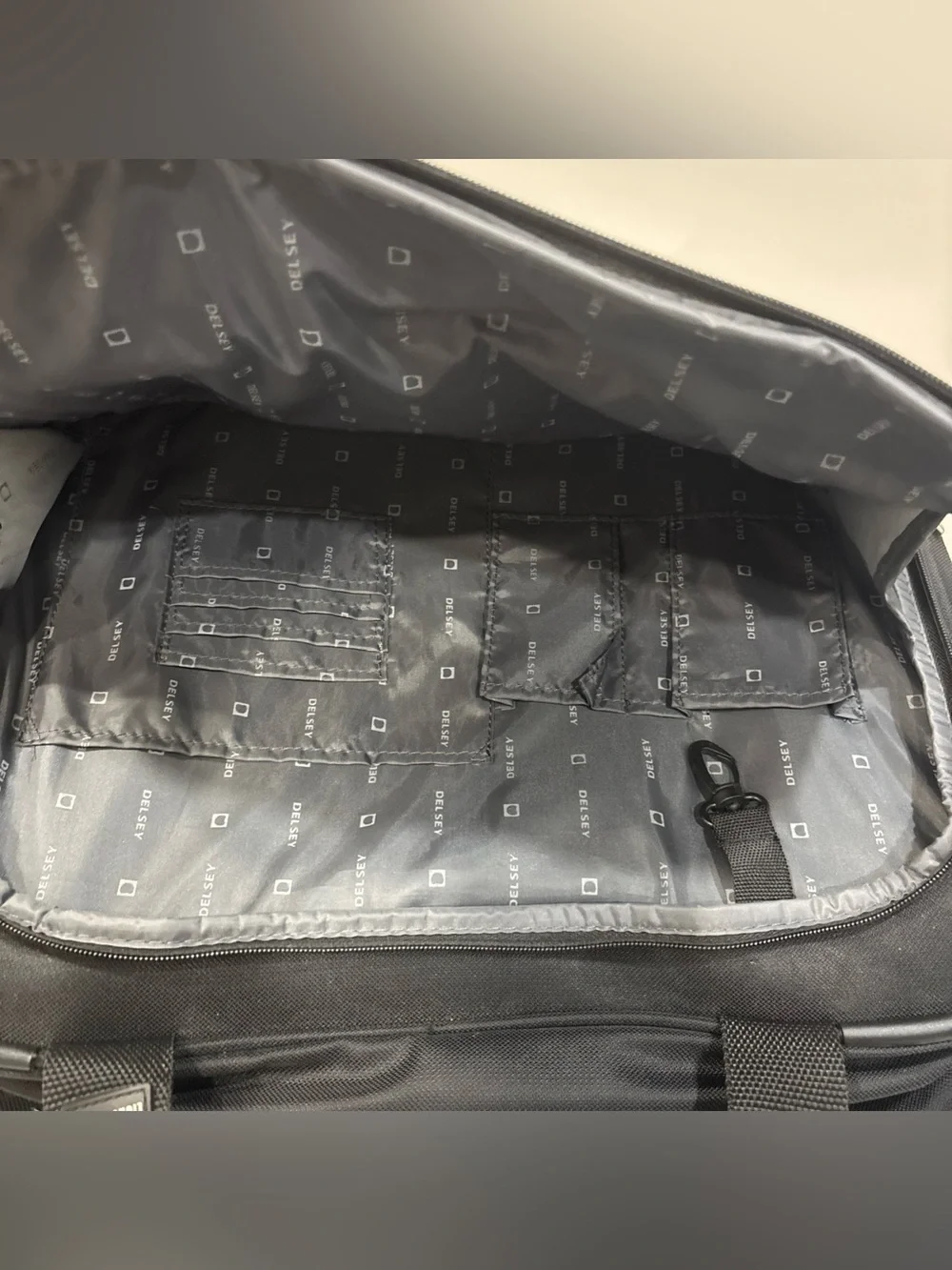 Delsey Paris black travel carryon with wheels luggage suitcase travel